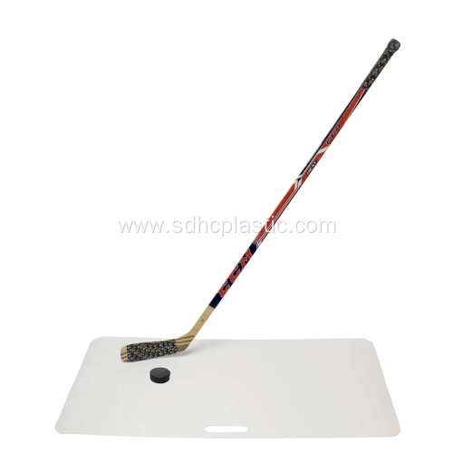 Synthetic ice shooting pad